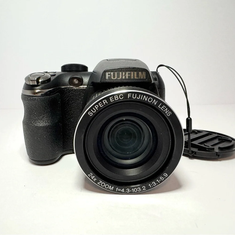 Fujifilm Black Digital Camera with Ergonomic Design and Prominent Lens